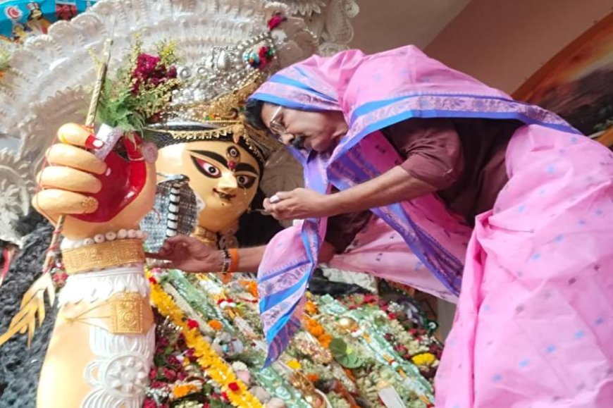 Men doing Jagaddhatri puja rituals in chandannagar