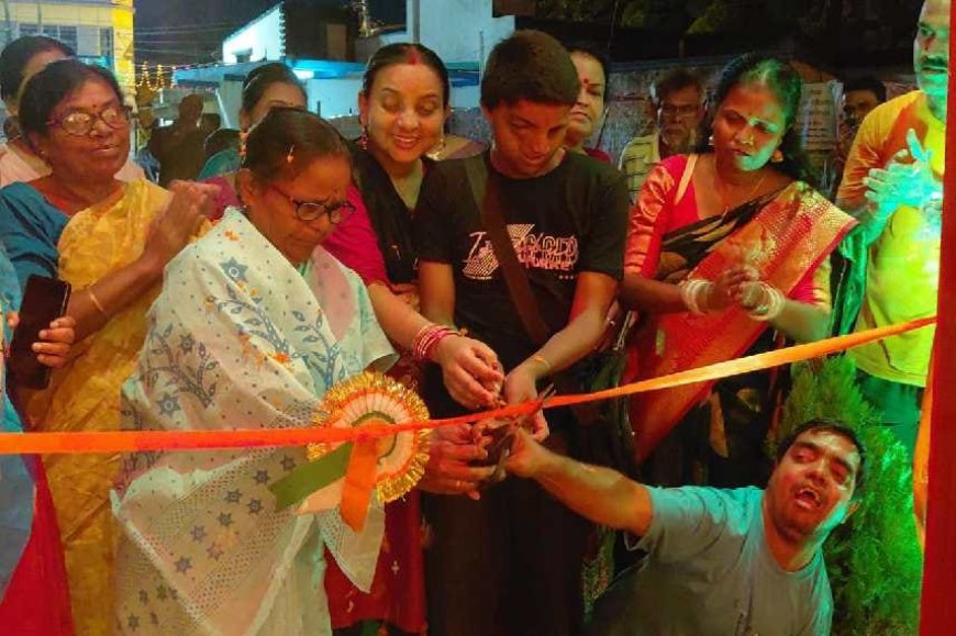 A group of specially abled people inaugurated the puja pavilion